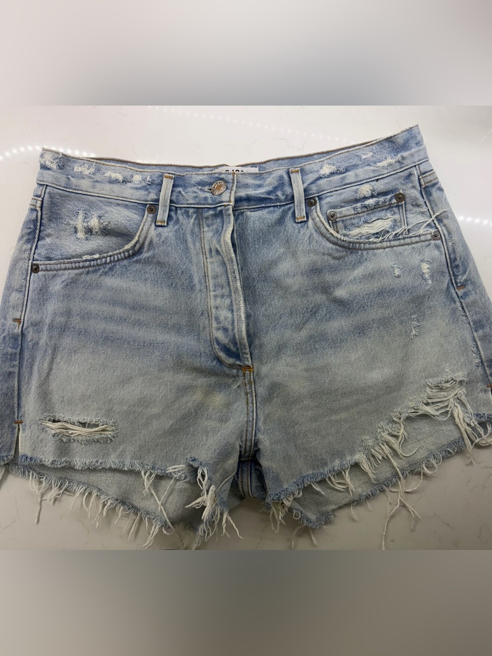 AGOLDE Light Wash Distressed Denim Shorts